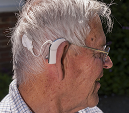man with cochlear implant